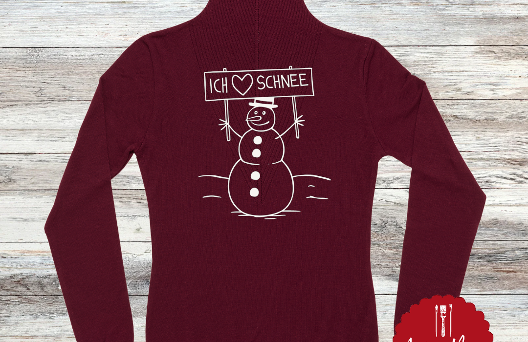 Suchst du nach Wintermotiven mit Charme? Diese Schneemänner werden Herzen schmelzen! ❄️ 3 Bunt gestrickter Pullover mit Schneemann-Motiv und Statement.