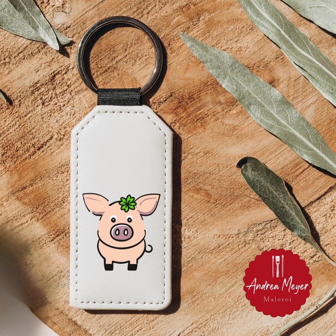 Glücksbringer zum Plotten: Meine neue Schweinchen-Plotterdatei ist da! 2 Schlüsselanhänger mit Schwein-Design, handgemalte Tierkunst, Tiermotive, Andrea Meyer Malerei.